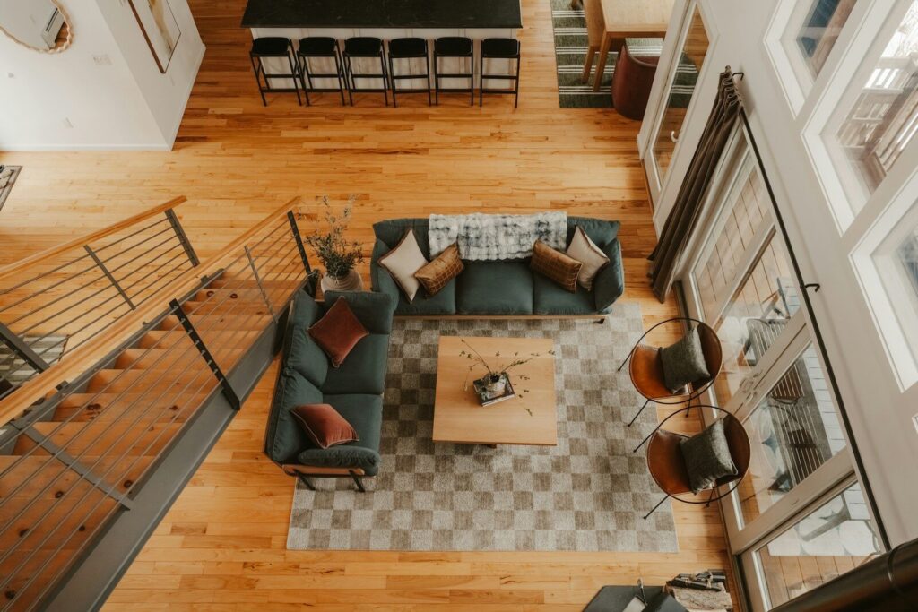 Spacious living room with modern furniture and wooden floors